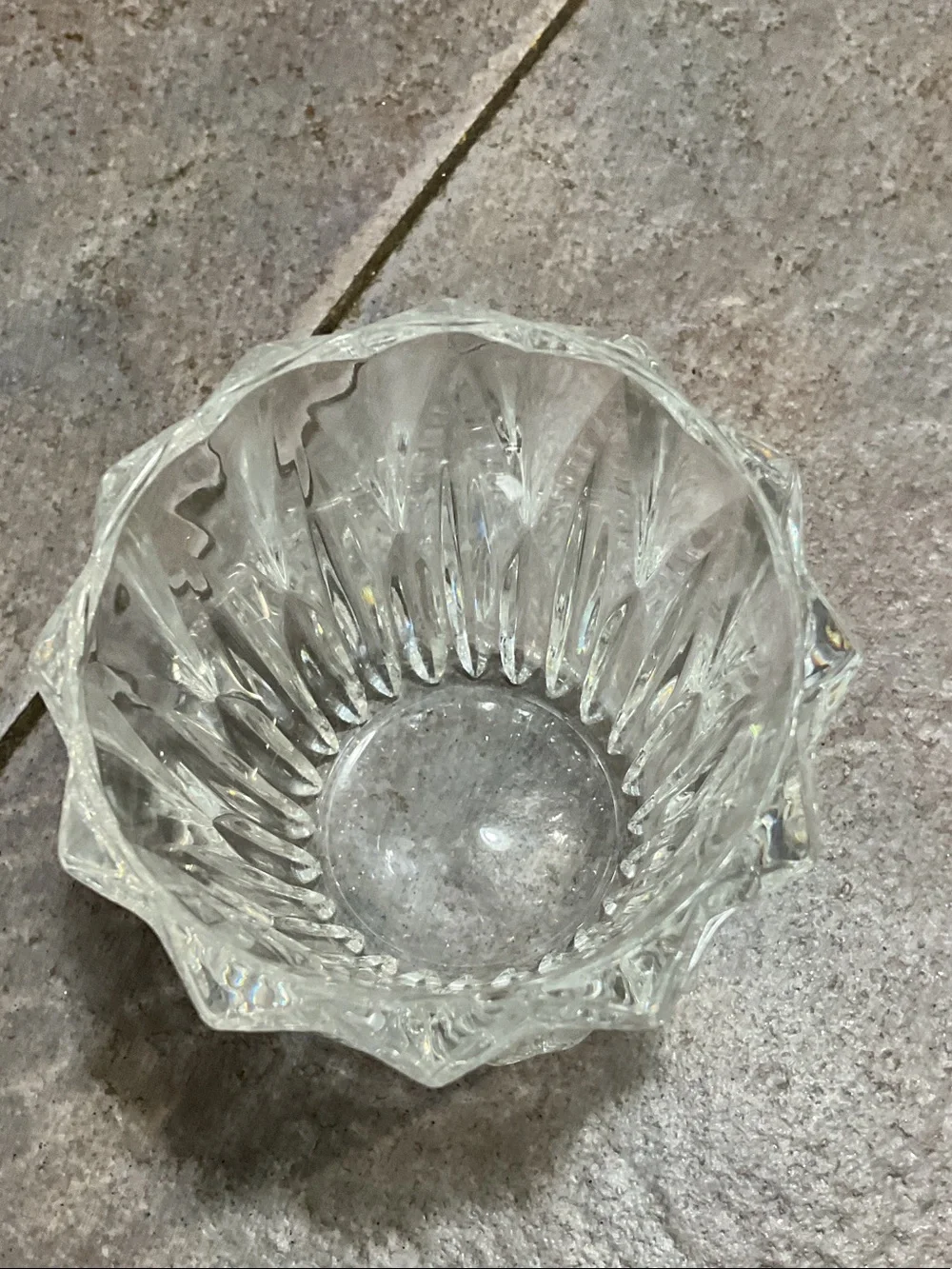 Brass candle holder with glass